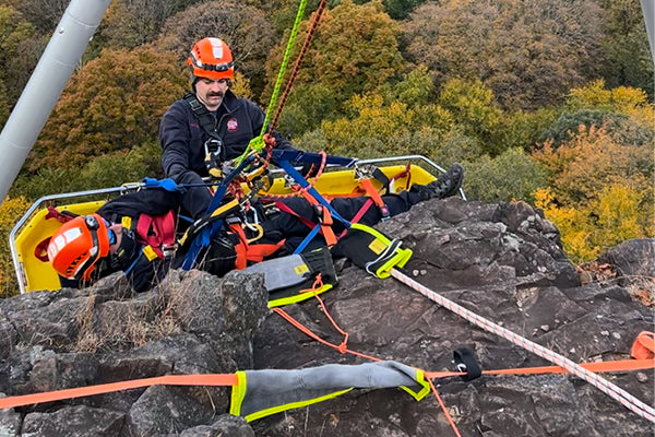 Student engaging in mountain rescue.